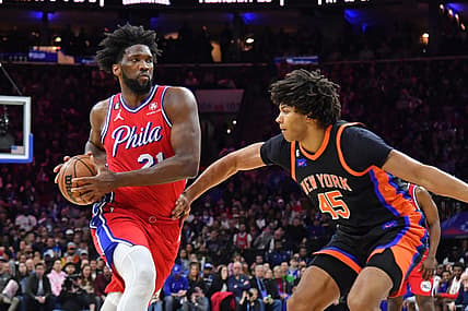 Feb 10, 2023; Philadelphia, Pennsylvania, USA; Philadelphia 76ers center Joel Embiid (21) drives to the basket against New York Knicks center Jericho Sims (45) at Wells Fargo Center. Mandatory Credit: Eric Hartline-USA TODAY Sports