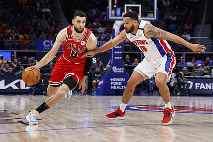 Mar 1, 2023; Detroit, Michigan, USA;  Chicago Bulls guard Zach LaVine (8) dribbles on Detroit Pistons guard Cory Joseph (18) in the second half at Little Caesars Arena. Mandatory Credit: Rick Osentoski-USA TODAY Sports