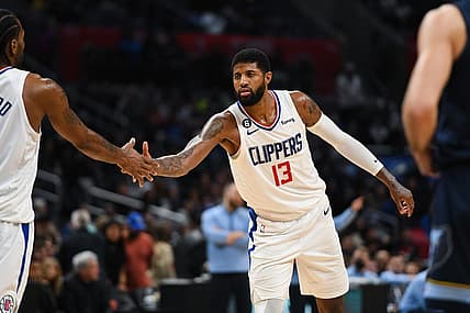 Mar 5, 2023; Los Angeles, California, USA; LA Clippers forward Paul George (13) celebrates with forward Kawhi Leonard (2) against [WHO] during fourth quarter at Crypto.com Arena. Mandatory Credit: Jonathan Hui-USA TODAY Sports