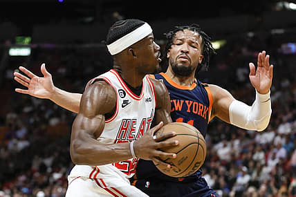 Mar 22, 2023; Miami, Florida, USA; Miami Heat forward Jimmy Butler (22) drives to the basket against New York Knicks guard Jalen Brunson (11) during the third quarter at Miami-Dade Arena. Mandatory Credit: Sam Navarro-USA TODAY Sports