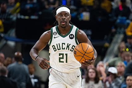Mar 29, 2023; Indianapolis, Indiana, USA; Milwaukee Bucks guard Jrue Holiday (21) dribbles the ball in the first quarter against the Indiana Pacers at Gainbridge Fieldhouse. Mandatory Credit: Trevor Ruszkowski-USA TODAY Sports