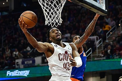 Mar 31, 2023; Cleveland, Ohio, USA; Cleveland Cavaliers guard Donovan Mitchell (45) drives to the basket against New York Knicks forward Obi Toppin (1) during the second half at Rocket Mortgage FieldHouse. Mandatory Credit: Ken Blaze-USA TODAY Sports