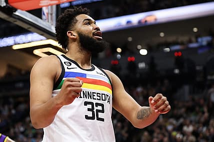 Mar 31, 2023; Minneapolis, Minnesota, USA; Minnesota Timberwolves center Karl-Anthony Towns (32) reacts to his shot against the Los Angeles Lakers during the third quarter at Target Center. Mandatory Credit: Matt Krohn-USA TODAY Sports