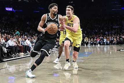 Apr 2, 2023; Brooklyn, New York, USA;  Brooklyn Nets guard Spencer Dinwiddie (26) looks to drive past Utah Jazz forward Kelly Olynyk (41) in the second quarter at Barclays Center. Mandatory Credit: Wendell Cruz-USA TODAY Sports