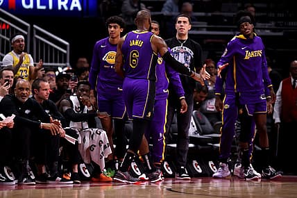 Apr 2, 2023; Houston, Texas, USA; Los Angeles Lakers forward LeBron James (6) shakes hands with teammates on the bench after leaving the game against the Houston Rockets during the fourth quarter at Toyota Center. Mandatory Credit: Erik Williams-USA TODAY Sports
