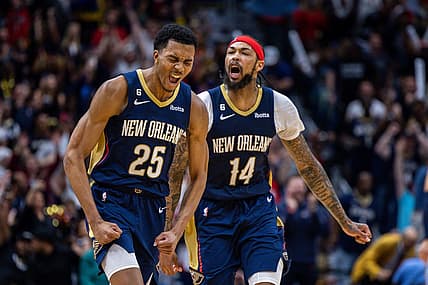 Apr 5, 2023; New Orleans, Louisiana, USA;  New Orleans Pelicans guard Trey Murphy III (25) reacts to making a three point basket with forward Brandon Ingram (14) against the Memphis Grizzlies during the second half at Smoothie King Center. Mandatory Credit: Stephen Lew-USA TODAY Sports