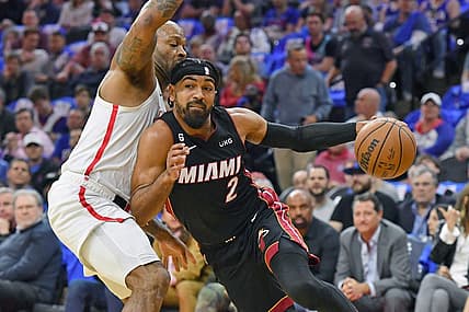 Apr 6, 2023; Philadelphia, Pennsylvania, USA; Miami Heat guard Gabe Vincent (2) drives to the basket against Philadelphia 76ers forward P.J. Tucker (17) during the first quarter at Wells Fargo Center. Mandatory Credit: Eric Hartline-USA TODAY Sports