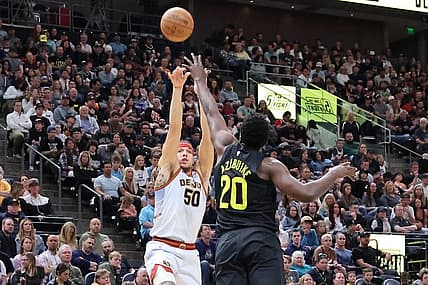 Apr 8, 2023; Salt Lake City, Utah, USA; Denver Nuggets forward Aaron Gordon (50) shoots over Utah Jazz center Udoka Azubuike (20) in the second quarter at Vivint Arena. Mandatory Credit: Rob Gray-USA TODAY Sports