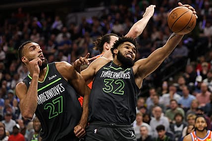 Apr 14, 2023; Minneapolis, Minnesota, USA; Minnesota Timberwolves center Karl-Anthony Towns (32) rebounds the ball against the Oklahoma City Thunder during the second quarter at Target Center. Mandatory Credit: Matt Krohn-USA TODAY Sports
