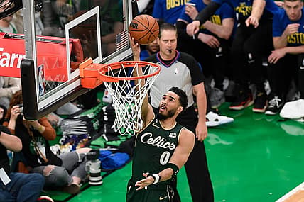 Apr 15, 2023; Boston, Massachusetts, USA; Boston Celtics forward Jayson Tatum (0) shoots a layup against the Atlanta Hawks during the first quarter of game one of the 2023 NBA playoffs at TD Garden. Mandatory Credit: Eric Canha-USA TODAY Sports