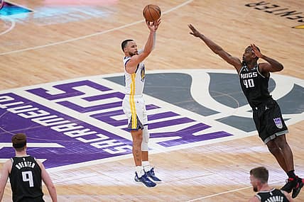 Apr 15, 2023; Sacramento, California, USA; Golden State Warriors guard Stephen Curry (30) makes a three point basket over Sacramento Kings forward Harrison Barnes (40) in the fourth quarter during game one of the 2023 NBA playoffs at the Golden 1 Center. Mandatory Credit: Cary Edmondson-USA TODAY Sports