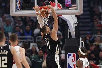 Apr 19, 2023; Milwaukee, Wisconsin, USA; Milwaukee Bucks center Brook Lopez (11) dunks during the first quarter against the Miami Heat during game two of the 2023 NBA Playoffs at Fiserv Forum. Mandatory Credit: Jeff Hanisch-USA TODAY Sports