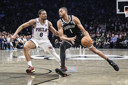 Apr 20, 2023; Brooklyn, New York, USA; Brooklyn Nets forward Mikal Bridges (1) looks to drive past Philadelphia 76ers guard De'Anthony Melton (8) during game three of the 2023 NBA playoffs at Barclays Center. Mandatory Credit: Wendell Cruz-USA TODAY Sports