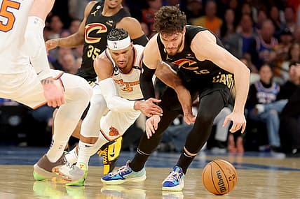 Apr 21, 2023; New York, New York, USA; New York Knicks guard Trevor Keels (3) and Cleveland Cavaliers forward Cedi Osman (16) fight for a loose ball during the second quarter of game three of the 2023 NBA playoffs at Madison Square Garden. Mandatory Credit: Brad Penner-USA TODAY Sports