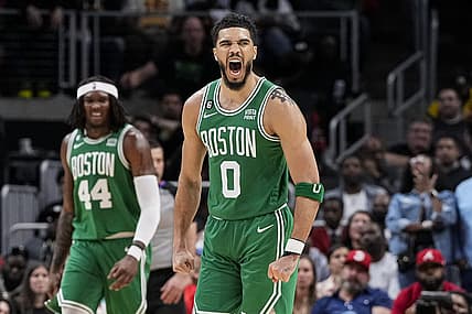 Apr 23, 2023; Atlanta, Georgia, USA; Boston Celtics forward Jayson Tatum (0) reacts after making a long three point shot against the Atlanta Hawks during the second half during game four of the 2023 NBA playoffs at State Farm Arena. Mandatory Credit: Dale Zanine-USA TODAY Sports