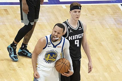 April 30, 2023; Sacramento, California, USA; Golden State Warriors guard Stephen Curry (30) celebrates in front of Sacramento Kings guard Kevin Huerter (9) during the fourth quarter in game seven of the 2023 NBA playoffs first round at Golden 1 Center. Mandatory Credit: Kyle Terada-USA TODAY Sports