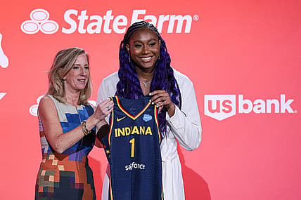Apr 10, 2023; New York, NY, USA; Aliyah Boston poses for a photo with WNBA Commissioner Cathy Engelbert after being drafted first overall by the Indiana Fever during WNBA Draft 2023 at Spring Studio. Mandatory Credit: Vincent Carchietta-USA TODAY Sports