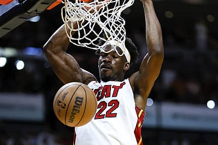 Apr 14, 2023; Miami, Florida, USA; Miami Heat forward Jimmy Butler (22) dunks the basketball during the first quarter against the Chicago Bulls at Kaseya Center. Mandatory Credit: Sam Navarro-USA TODAY Sports