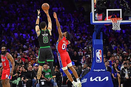 May 5, 2023; Philadelphia, Pennsylvania, USA; Boston Celtics forward Jayson Tatum (0) shoots a three point basket over Philadelphia 76ers guard Tyrese Maxey (0) during the second quarter of game three of the 2023 NBA playoff at Wells Fargo Center. Mandatory Credit: Eric Hartline-USA TODAY Sports