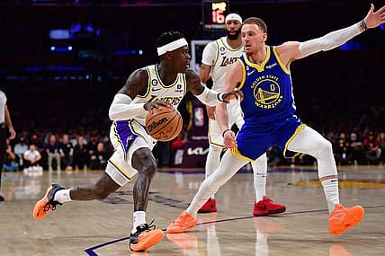 May 6, 2023; Los Angeles, California, USA; Los Angeles Lakers guard Dennis Schroder (17) moves the ball against Golden State Warriors guard Donte DiVincenzo (0) during the first half in game three of the 2023 NBA playoffs at Crypto.com Arena. Mandatory Credit: Gary A. Vasquez-USA TODAY Sports