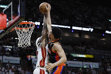 May 8, 2023; Miami, Florida, USA; Miami Heat forward Jimmy Butler (22) blocks a dunk attempt from New York Knicks guard Quentin Grimes (6) in the second quarter during game four of the 2023 NBA playoffs at Kaseya Center. Mandatory Credit: Sam Navarro-USA TODAY Sports