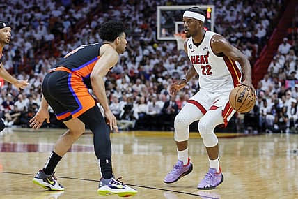 May 8, 2023; Miami, Florida, USA; Miami Heat forward Jimmy Butler (22) dribbles the basketball as New York Knicks guard Quentin Grimes (6) defends in the third quarter during game four of the 2023 NBA playoffs at Kaseya Center. Mandatory Credit: Sam Navarro-USA TODAY Sports