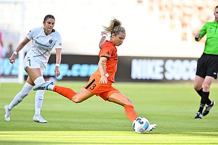 May 29, 2022; Houston, Texas, USA; Houston Dash forward Rachel Daly (3) kicks the ball during the first half against the North Carolina Courage in a NWSL match at PNC Stadium. Mandatory Credit: Maria Lysaker-USA TODAY Sports