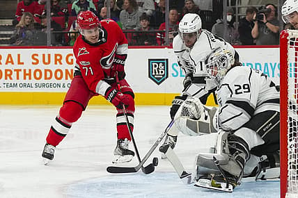 Jan 31, 2023; Raleigh, North Carolina, USA; Los Angeles Kings goaltender Pheonix Copley (29) and center Anze Kopitar (11) stop the shot attempt by Carolina Hurricanes right wing Jesper Fast (71) during the first period at PNC Arena. Mandatory Credit: James Guillory-USA TODAY Sports
