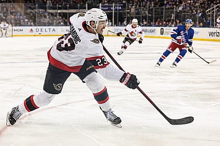 Mar 2, 2023; New York, New York, USA; Ottawa Senators defenseman Travis Hamonic (23) shoots the puck during the third period against the New York Rangers at Madison Square Garden. Mandatory Credit: Vincent Carchietta-USA TODAY Sports