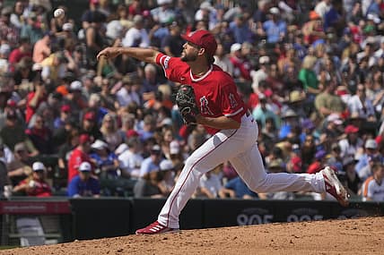 Mar 18, 2023; Tempe, Arizona, USA; Los Angeles Angels relief pitcher Ryan Tepera (52) throws against the Texas Rangers in the fifth inning at Tempe Diablo Stadium. Mandatory Credit: Rick Scuteri-USA TODAY Sports