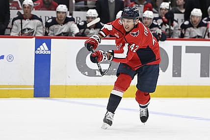 Mar 21, 2023; Washington, District of Columbia, USA; Washington Capitals defenseman Martin Fehervary (42) assists on a goal by Washington Capitals right wing T.J. Oshie (not shown) against the Columbus Blue Jackets during the first period at Capital One Arena. Mandatory Credit: Brad Mills-USA TODAY Sports