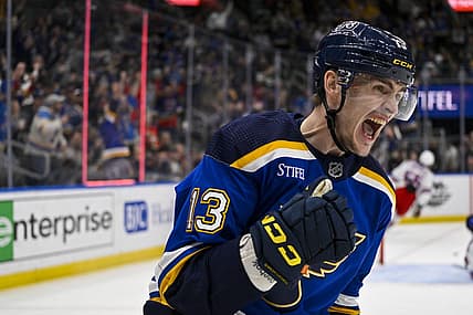 Apr 6, 2023; St. Louis, Missouri, USA;  St. Louis Blues right wing Alexey Toropchenko (13) reacts after scoring against the New York Rangers during the second period at Enterprise Center. Mandatory Credit: Jeff Curry-USA TODAY Sports