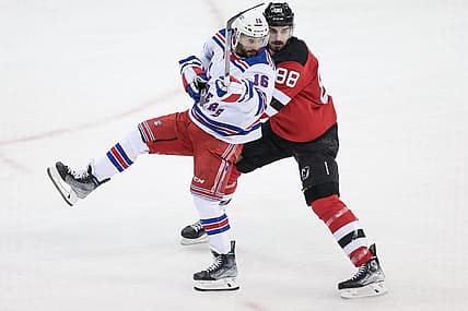 Apr 20, 2023; Newark, New Jersey, USA; New York Rangers center Vincent Trocheck (16) and New Jersey Devils defenseman Kevin Bahl (88) during the first period in game two of the first round of the 2023 Stanley Cup Playoffs at Prudential Center. Mandatory Credit: Vincent Carchietta-USA TODAY Sports