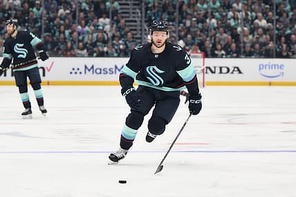 Apr 28, 2023; Seattle, Washington, USA; Seattle Kraken defenseman Will Borgen (3) advances the puck in game six of the first round of the 2023 Stanely Cup Playoffs at Climate Pledge Arena. Mandatory Credit: Steven Bisig-USA TODAY Sports
