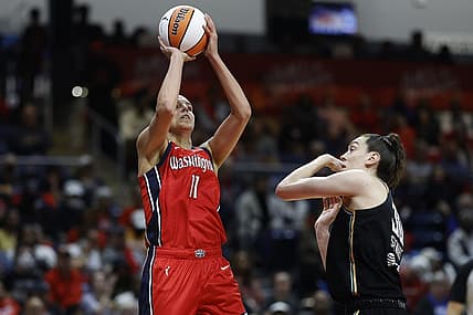 May 19, 2023; Washington, District of Columbia, USA; Washington Mystics forward Elena Delle Donne (11) shoots the ball over New York Liberty forward Breanna Stewart (30) in the fourth quarter at Entertainment & Sports Arena. Mandatory Credit: Geoff Burke-USA TODAY Sports