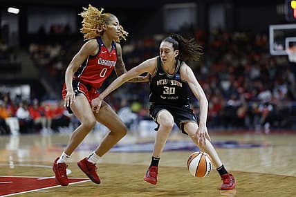 May 19, 2023; Washington, District of Columbia, USA; New York Liberty forward Breanna Stewart (30) drives to the basket as Washington Mystics center Shakira Austin (0) defends at Entertainment & Sports Arena. Mandatory Credit: Geoff Burke-USA TODAY Sports