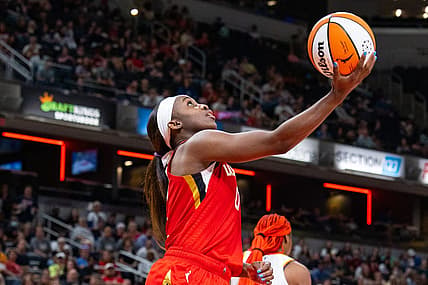 Jun 4, 2023; Indianapolis, Indiana, USA; Las Vegas Aces guard Jackie Young (0) shoots the ball in the second half against the Indiana Fever at Gainbridge Fieldhouse. Mandatory Credit: Trevor Ruszkowski-USA TODAY Sports