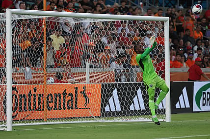 Jul 8, 2023; Houston, Texas, USA; Sporting Kansas City goalkeeper Kendall McIntosh (22) makes a save during the first half against the Houston Dynamo at Shell Energy Stadium. Mandatory Credit: Thomas Shea-USA TODAY Sports