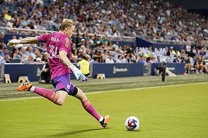 Jun 24, 2023; Kansas City, Kansas, USA; Chicago Fire goalkeeper Chris Brady (34) puts the ball in play against Sporting Kansas City during the match at Children's Mercy Park. Mandatory Credit: Denny Medley-USA TODAY Sports
