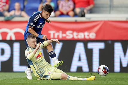 Jul 12, 2023; Harrison, New Jersey, USA; New York Red Bulls forward Cameron Harper (17) blocks a shot by FC Cincinnati midfielder Alvaro Barreal (31) during the first half at Red Bull Arena. Mandatory Credit: Brad Penner-USA TODAY Sports
