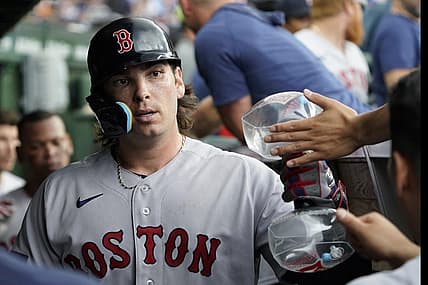 Jul 15, 2023; Chicago, Illinois, USA; Boston Red Sox first baseman Triston Casas (36) is greeted in the dugout after hitting a two-run home run against the Chicago Cubs during the seventh inning at Wrigley Field. Mandatory Credit: David Banks-USA TODAY Sports