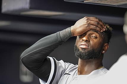 Jul 16, 2023; Cumberland, Georgia, USA; Chicago White Sox center fielder Luis Robert Jr. (88) reacts while standing under the air conditioner vent in the dugout against the Atlanta Braves during the seventh inning at Truist Park. Mandatory Credit: Dale Zanine-USA TODAY Sports