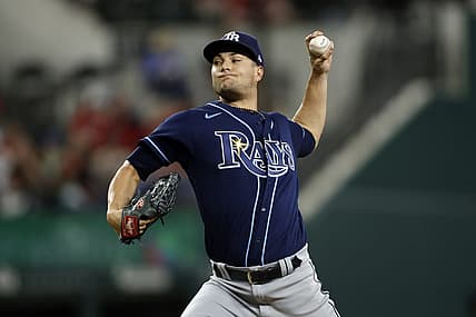 Jul 17, 2023; Arlington, Texas, USA; Tampa Bay Rays starting pitcher Shane McClanahan (18) throws a pitch in the third inning against the Texas Rangers at Globe Life Field. Mandatory Credit: Tim Heitman-USA TODAY Sports