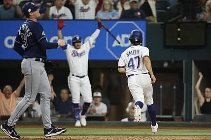 Jul 17, 2023; Arlington, Texas, USA; Texas Rangers shortstop Josh Smith (47) scores the winning run on a wild pitch in the ninth inning against the Tampa Bay Rays at Globe Life Field. Mandatory Credit: Tim Heitman-USA TODAY Sports