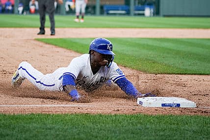 Jul 18, 2023; Kansas City, Missouri, USA; Kansas City Royals right fielder Dairon Blanco (44) reaches on a one run triple against the Detroit Tigers in the third inning at Kauffman Stadium. Mandatory Credit: Denny Medley-USA TODAY Sports
