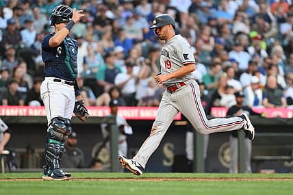 Jul 18, 2023; Seattle, Washington, USA; Minnesota Twins first baseman Alex Kirilloff (19) scores a run off a double hit by right fielder Max Kepler (26) (not pictured) during the fourth inning against the Seattle Mariners at T-Mobile Park. Mandatory Credit: Steven Bisig-USA TODAY Sports