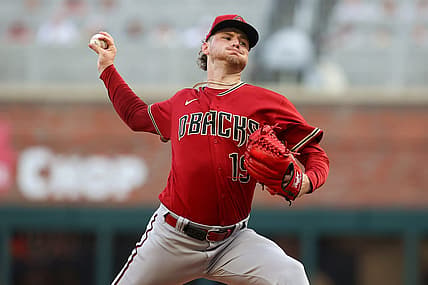 Jul 19, 2023; Atlanta, Georgia, USA; Arizona Diamondbacks starting pitcher Ryne Nelson (19) throws against the Atlanta Braves in the first inning at Truist Park. Mandatory Credit: Brett Davis-USA TODAY Sports