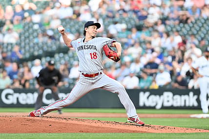 Jul 19, 2023; Seattle, Washington, USA; Minnesota Twins starting pitcher Kenta Maeda (18) pitches to the Seattle Mariners during the swconds inning at T-Mobile Park. Mandatory Credit: Steven Bisig-USA TODAY Sports