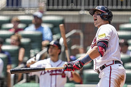 Jul 20, 2023; Cumberland, Georgia, USA; Atlanta Braves third baseman Austin Riley (27) reacts after hitting a home run against the Arizona Diamondbacks during the eighth inning at Truist Park. Mandatory Credit: Dale Zanine-USA TODAY Sports