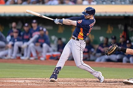 Jul 21, 2023; Oakland, California, USA;  Houston Astros right fielder Kyle Tucker (30) hits a two run home run during the fifth inning against the Oakland Athletics at Oakland-Alameda County Coliseum. Mandatory Credit: Stan Szeto-USA TODAY Sports